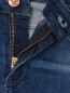 Узкие джинсы с эффектом потертости Diesel  –  Деталь1